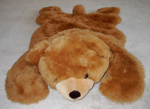 stuffed animal bear rug